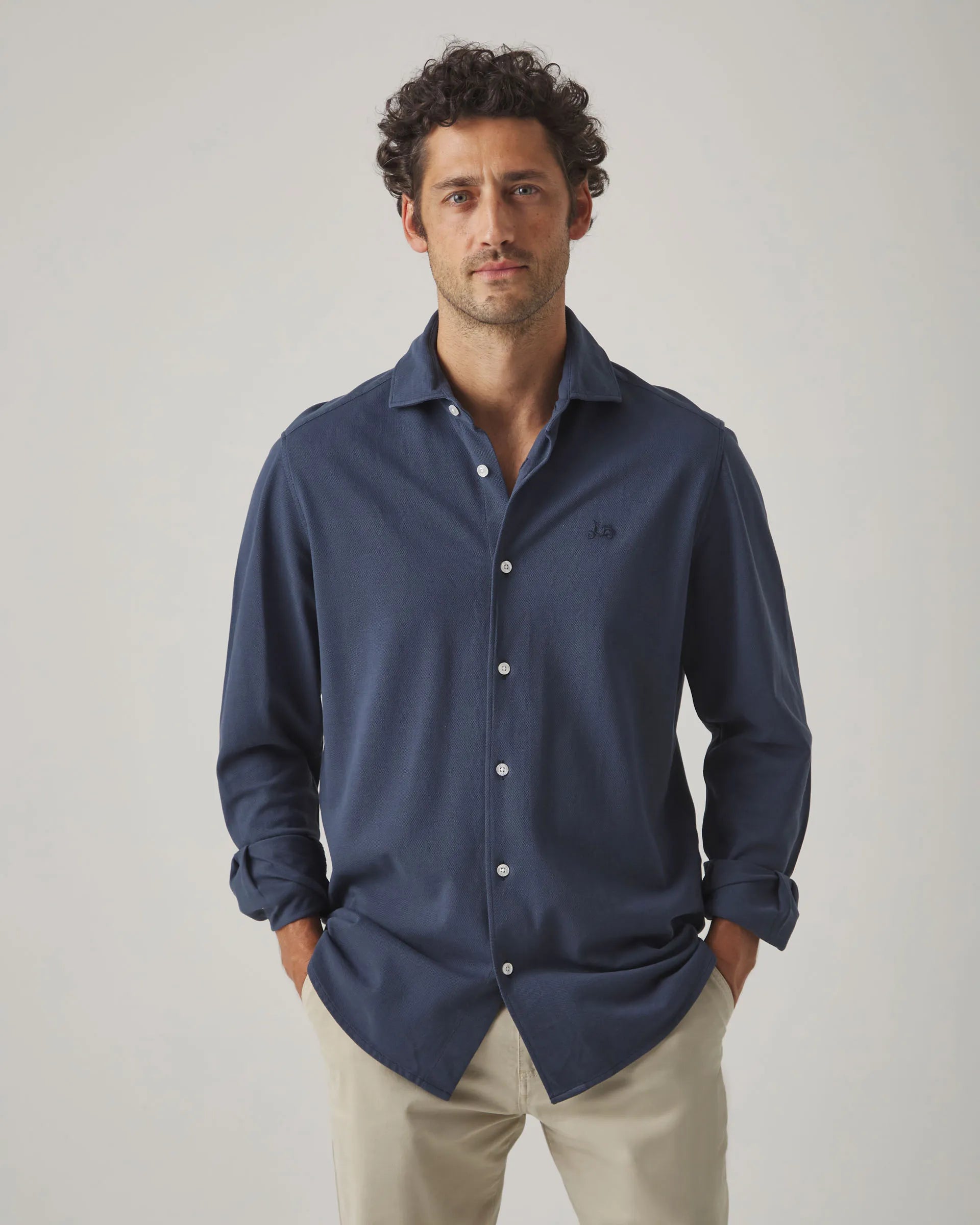 Camisa polo azul marino