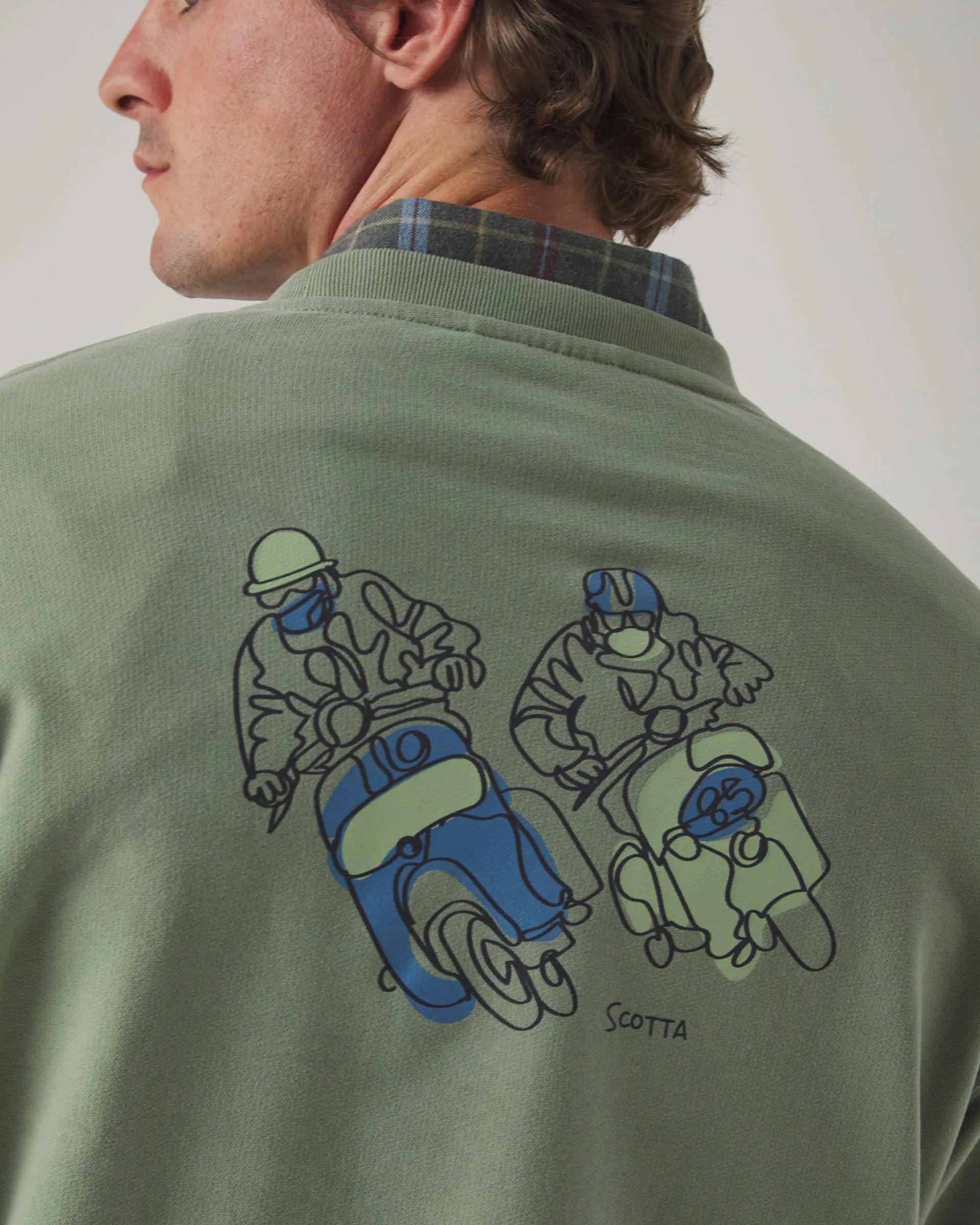 Sudadera en color verde con dibujo