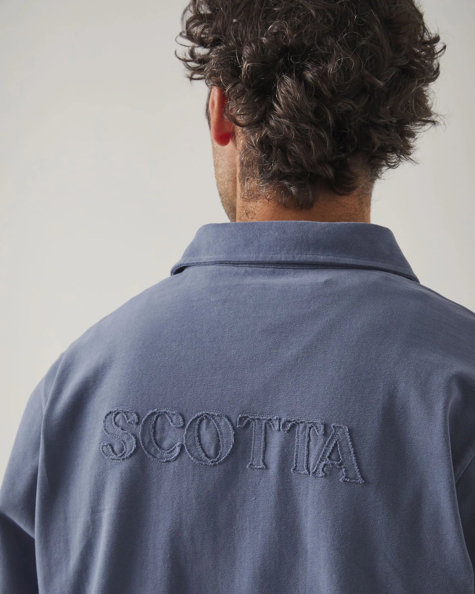 Polo de manga larga azul