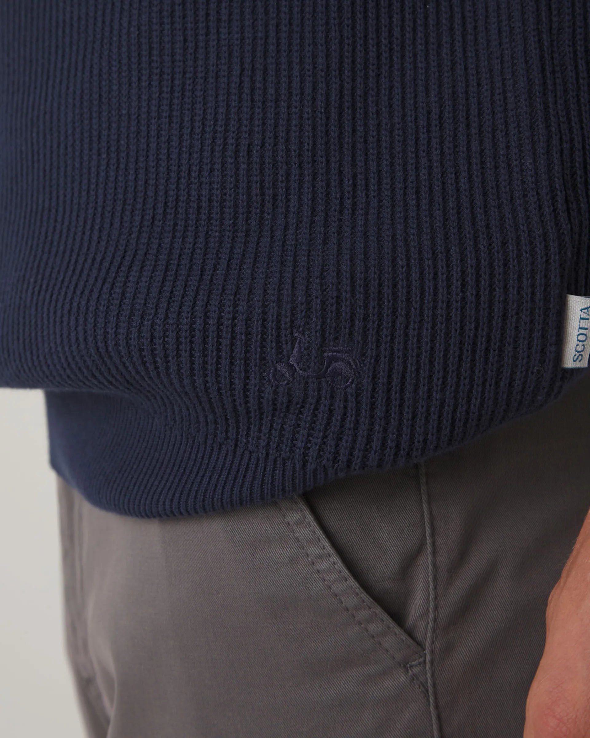 Polo de punto liso azul