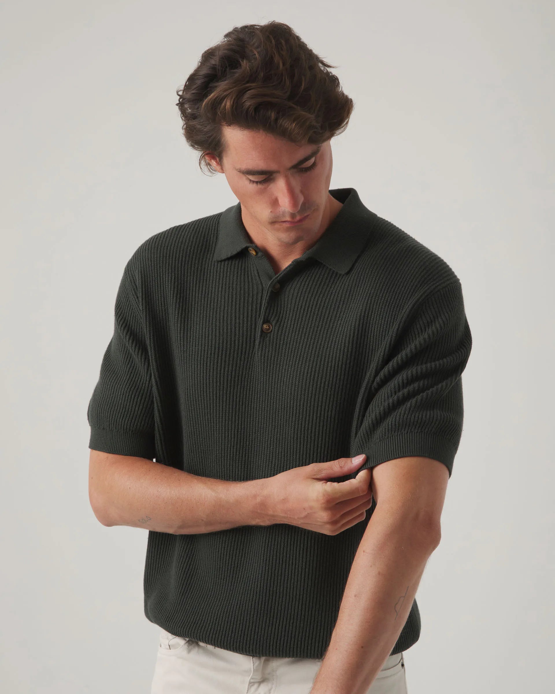 Polo de punto liso verde