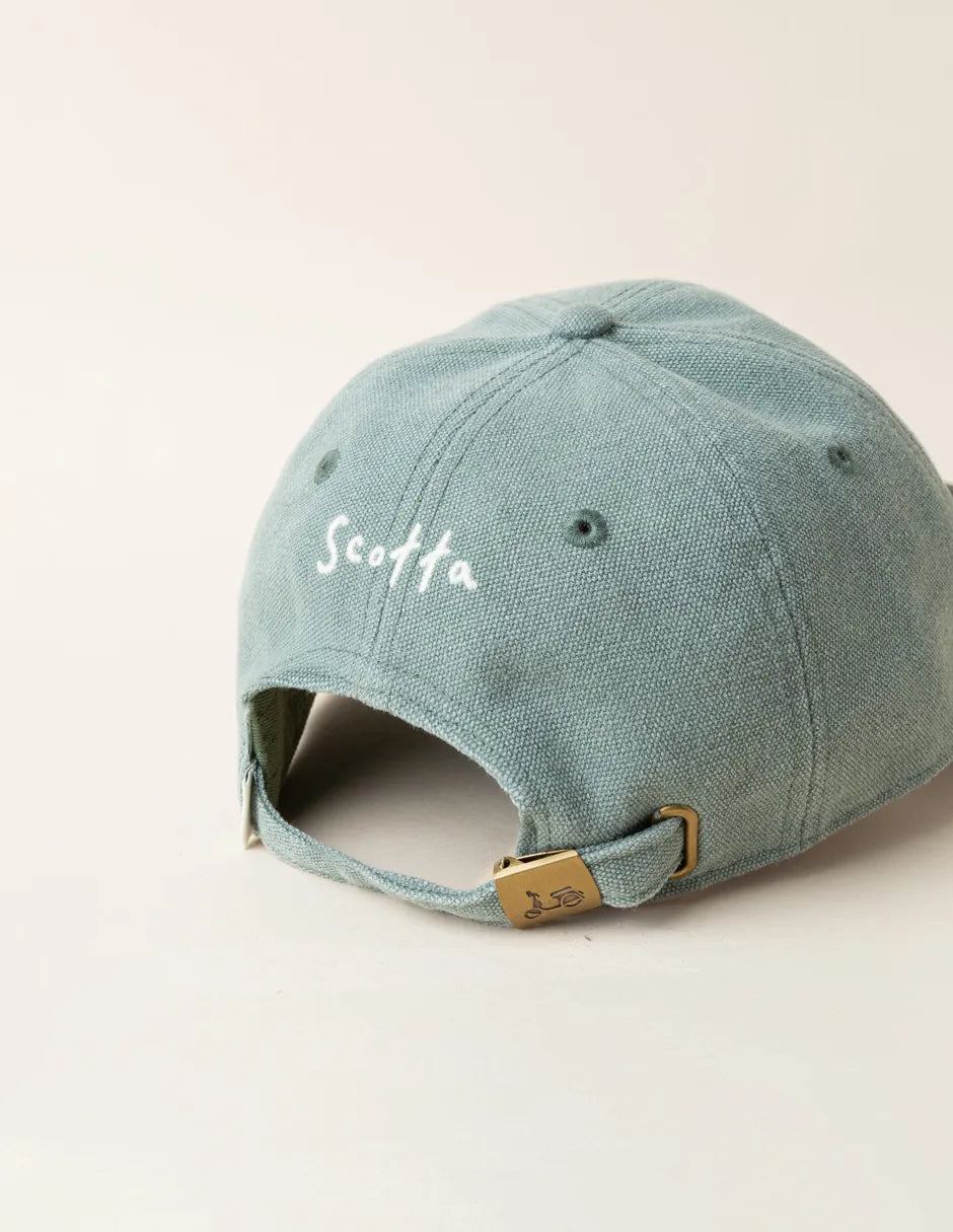 Gorra efecto lavado en verde océano