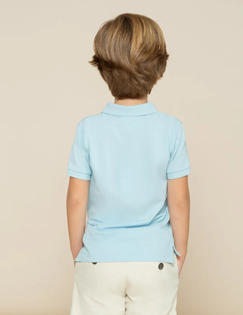 Polo azul claro de niño