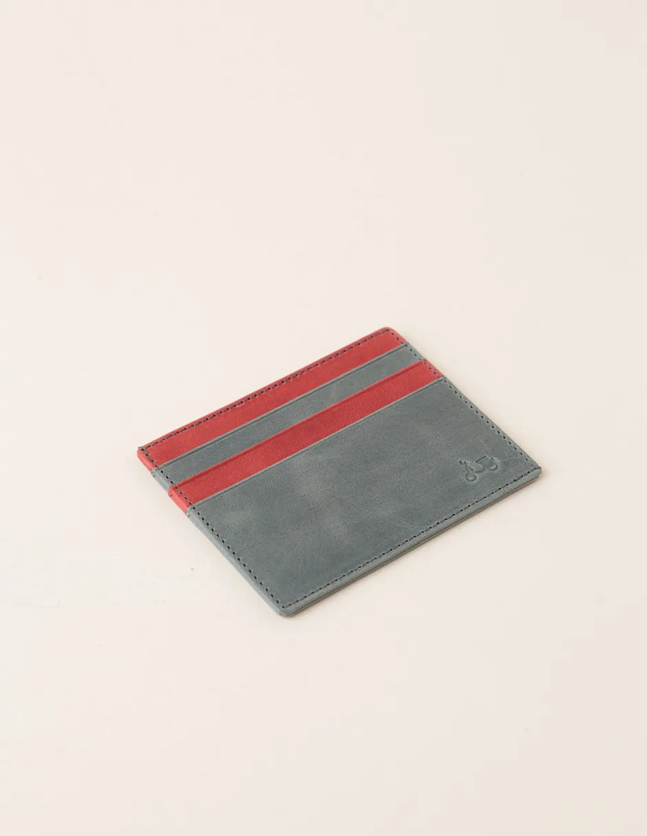 Tarjetero de piel verde y burdeos