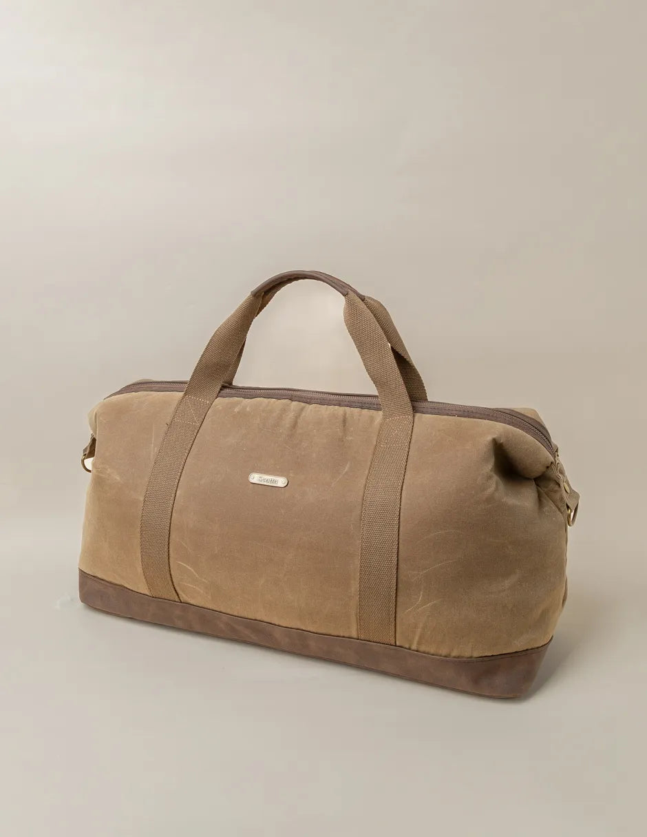 Bolsa de viaje beige con logo