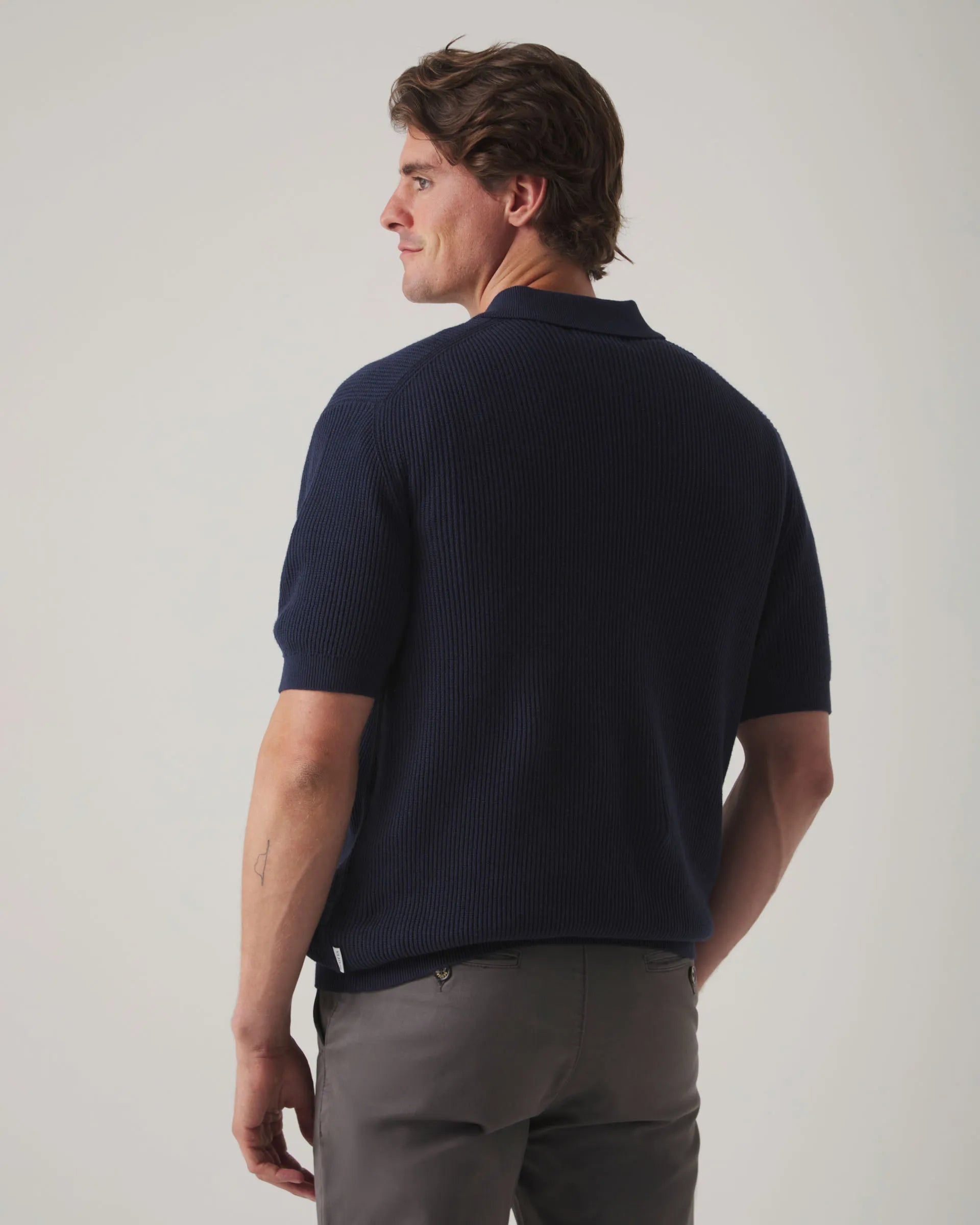 Polo de punto liso azul