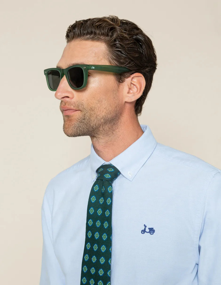 Camisa oxford azul con logo