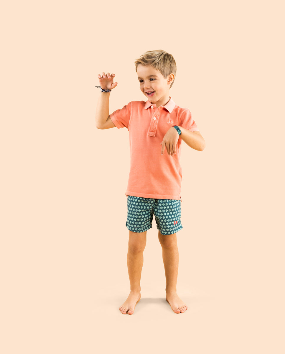 Polo niño tinte prenda naranja fluor