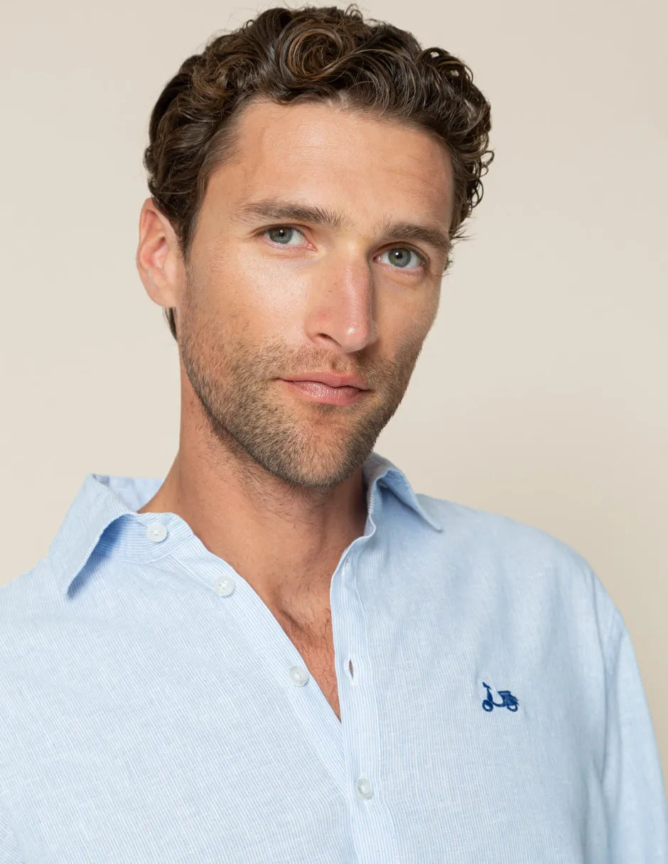 Camisa polo listrada azul claro li-co