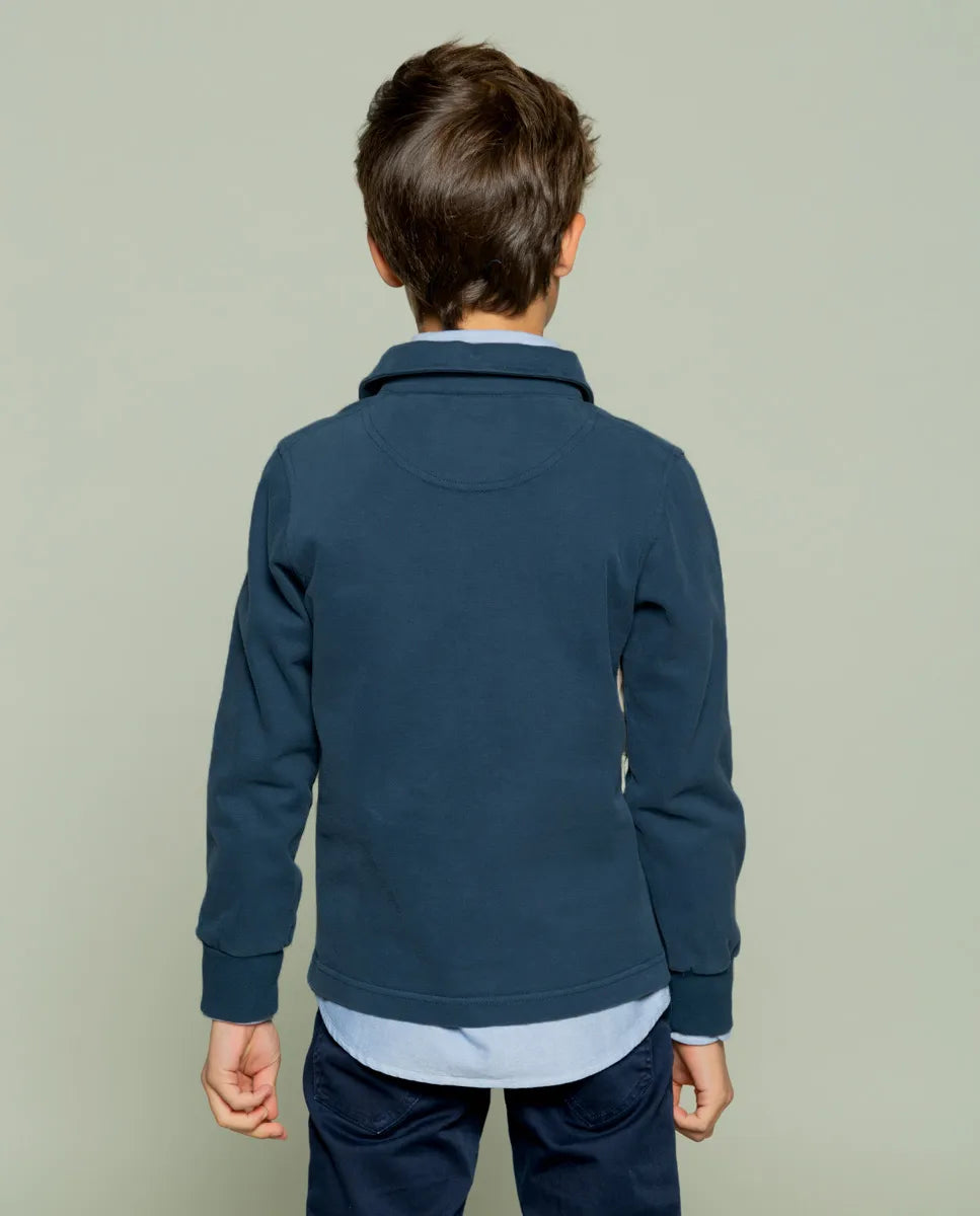 Polo niño trico marino